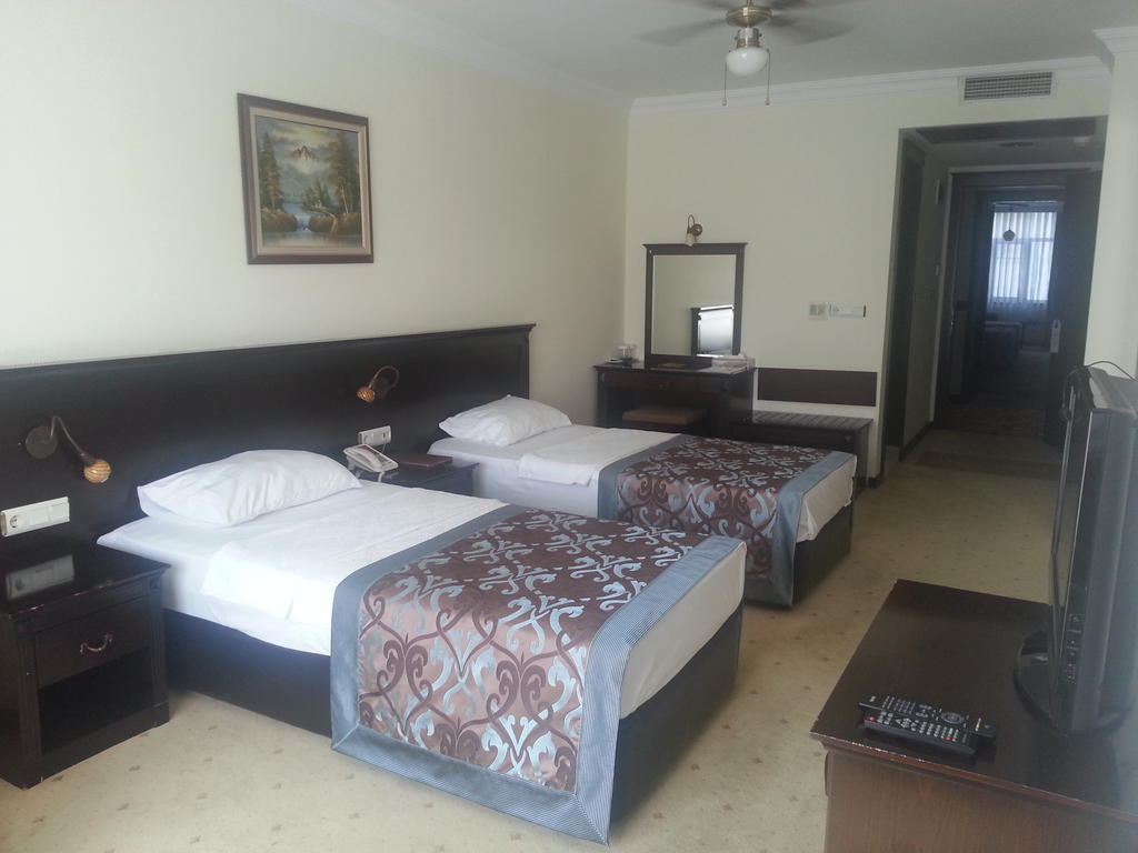 Omur Hotel Акчай Номер фото